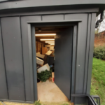 An image of the exterior of the bike storage before conversion